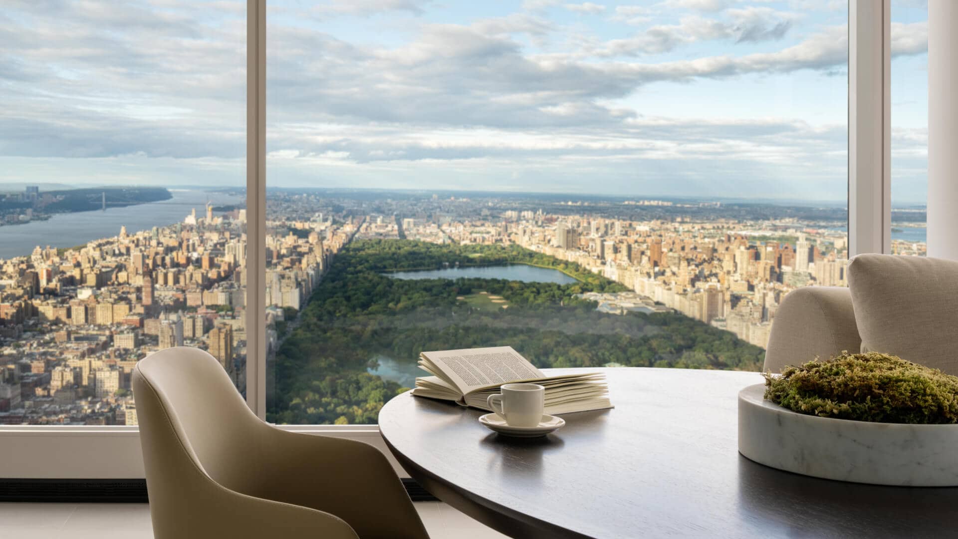 View of Central Park and New York City from the dining room of a luxury condominium at Central Park Tower.