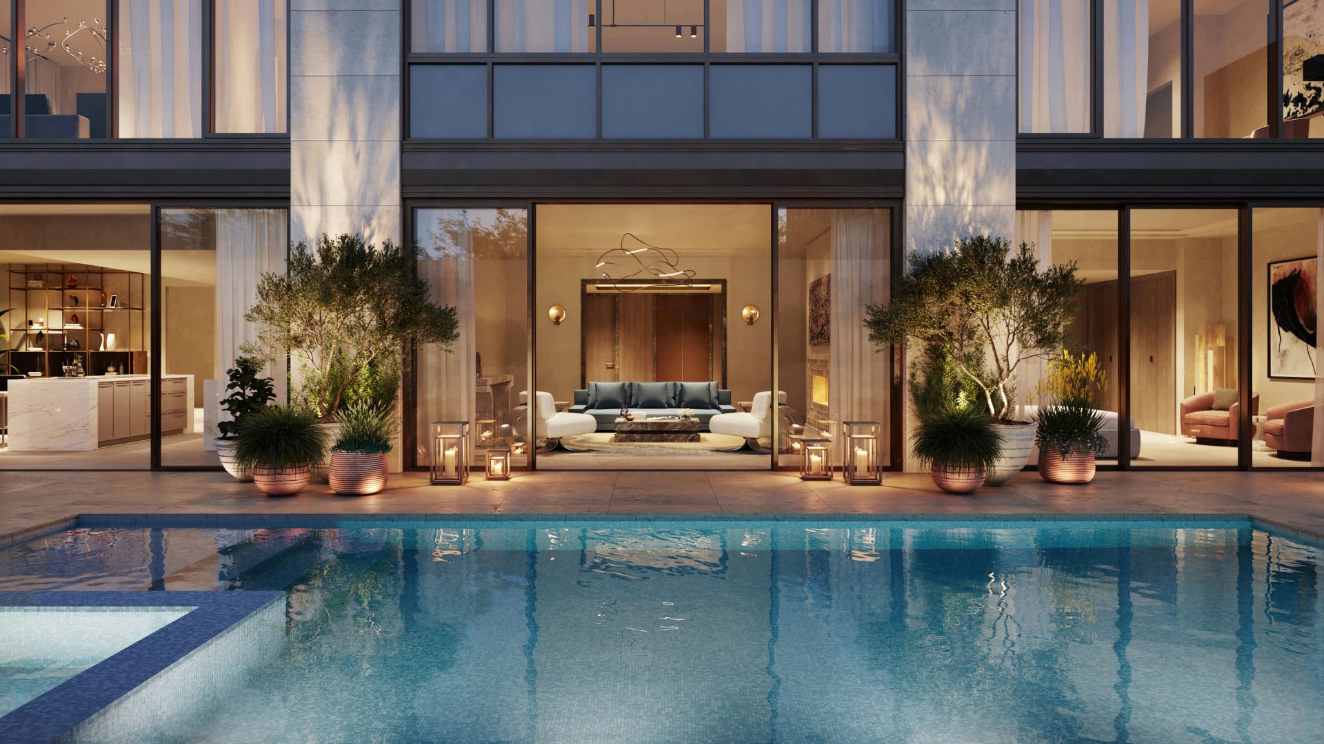 Poolside view at Rosewood Residences in Beverly Hills looking into the kitchen and living room of a luxury home.